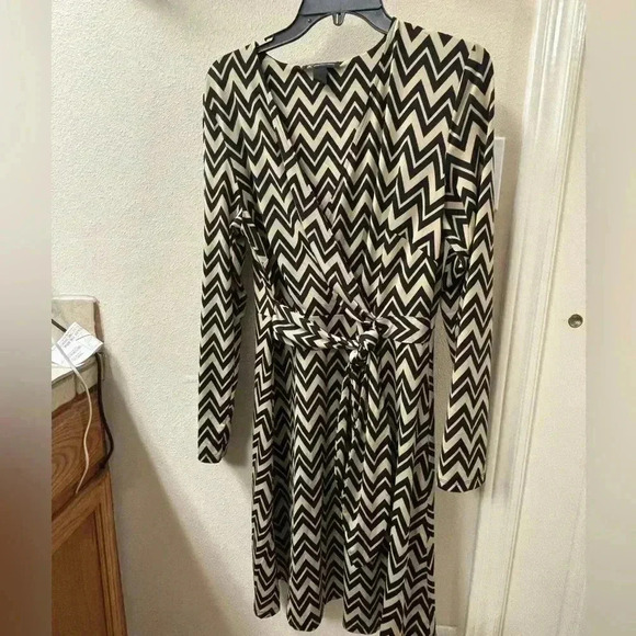INC size Large women’s dress tan and black chevron pattern. Flattering and soft!